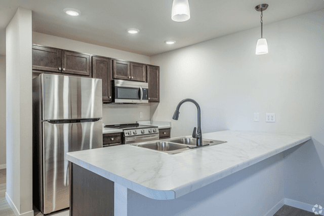 Modern kitchen with stainless steel appliances