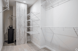 Spacious walk-in closet with built-in storage