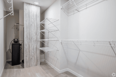 Spacious walk-in closet with built-in storage